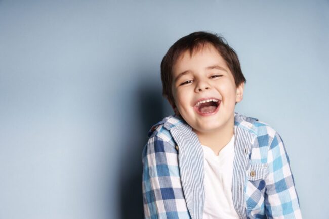 5ff49c82228a06e54a8fd794_shutterstock_126071342-1024×683 a little boy smiling
