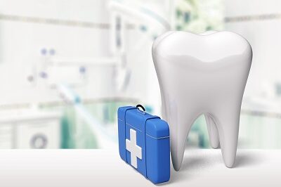 a tooth by a briefcase