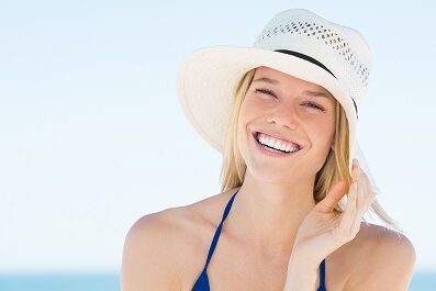 a woman wearing a sun hat