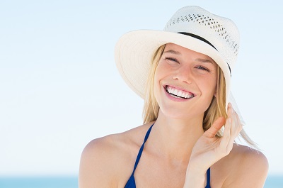a woman wearing a sun hat