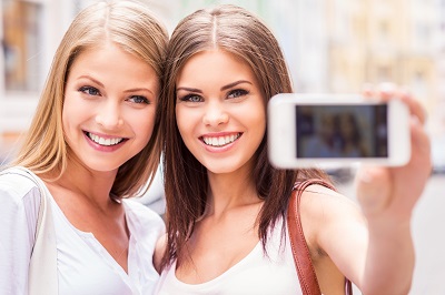 2 woman smiling