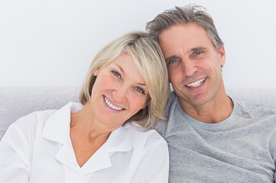 an older couple smiling together